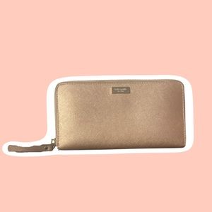 KATE SPADE LARGE CONTINENTAL ALL OVER ZIPPED WALLET IN ROSE GOLD